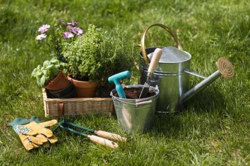 Team of gardeners preparing tools on site