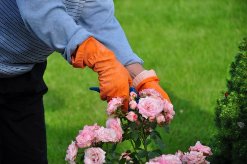 Well-equipped gardening team with PPE and safety gear